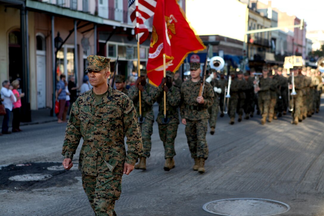 Sgt. Maj. Eric Kuhns, battalion sergeant major for Headquarters Battalion, Marine Forces Reserve, leads MARFORRES Marines through the streets of New Orleans during the Louisiana bicentennial military parade Nov. 10. The Marine contingent was comprised of the Marine Corps Band New Orleans, four platoons of Marines as well as several vehicles and a colorguard. More than 150 Marines total participated in the event.