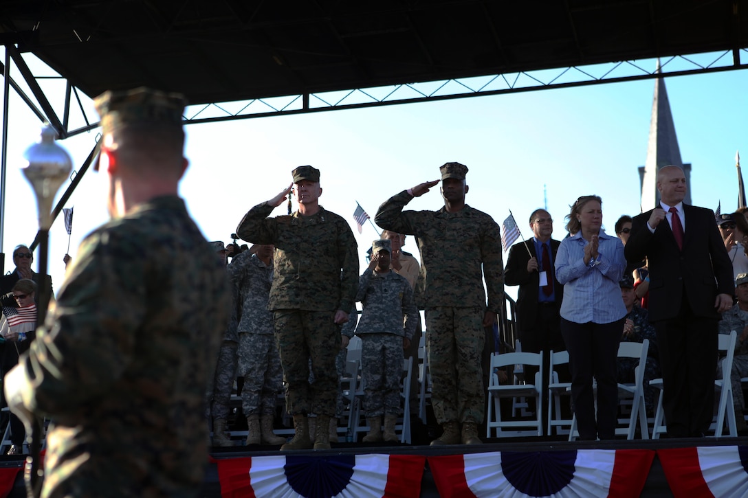 Lt. Gen. Steven A. Hummer, commander of Marine Forces Reserve, and Sgt. Maj. Robert Hightower, division sergeant major of 4th Marine Division, salute the Marines of Marine Forces Reserve during the Louisiana bicentennial military parade Nov. 10. The parade was held on the 237th anniversary of the Marine Corps' founding in 1775. Marines celebrated their birthday with a cake-cutting ceremony following the parade through downtown New Orleans.