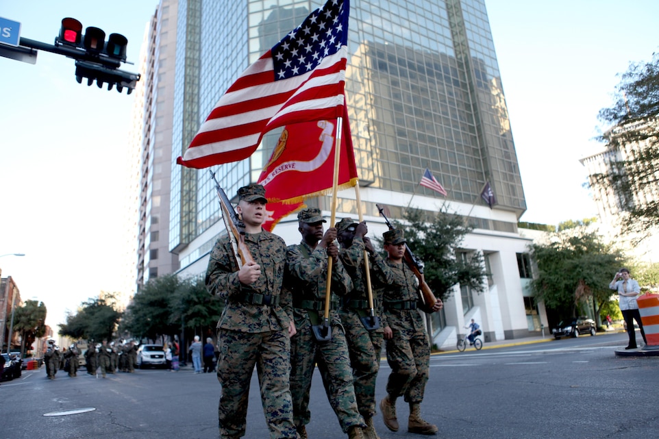 The Marine Forces Reserve colorguard led a contingent of MARFORRES Marines through the streets of New Orleans Nov. 10, as a part of Louisiana's bicentennial military parade. The Marines were not only celebrating the bicentennial, but Veterans Day and the birthday of the Marine Corps as well. More than 150 Marines participated in the parade as thousands of New Orleanians cheered from the roadsides.