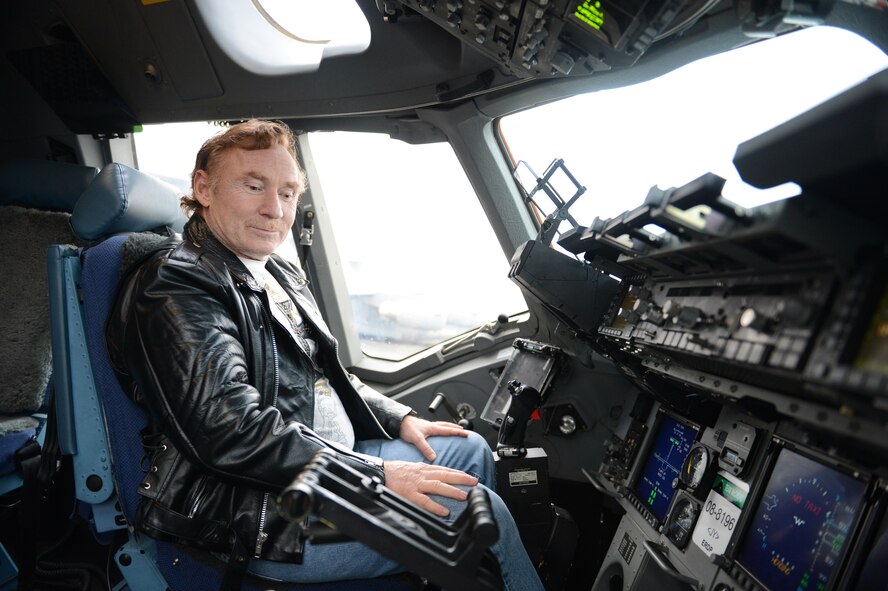 Danny Bonaduce, local radio host for KZOK channel 102.5 FM and former child actor, explores the cockpit of a C-17 Globemaster III aircraft, Nov. 15, 2012 at Joint Base Lewis-McChord, Wash. Bonaduce toured several places on McChord Field including the Western Air Defense Sector, a C-17 static display and the McChord Field control tower. (U.S. Air Force photo/Staff Sgt. Sean Tobin)