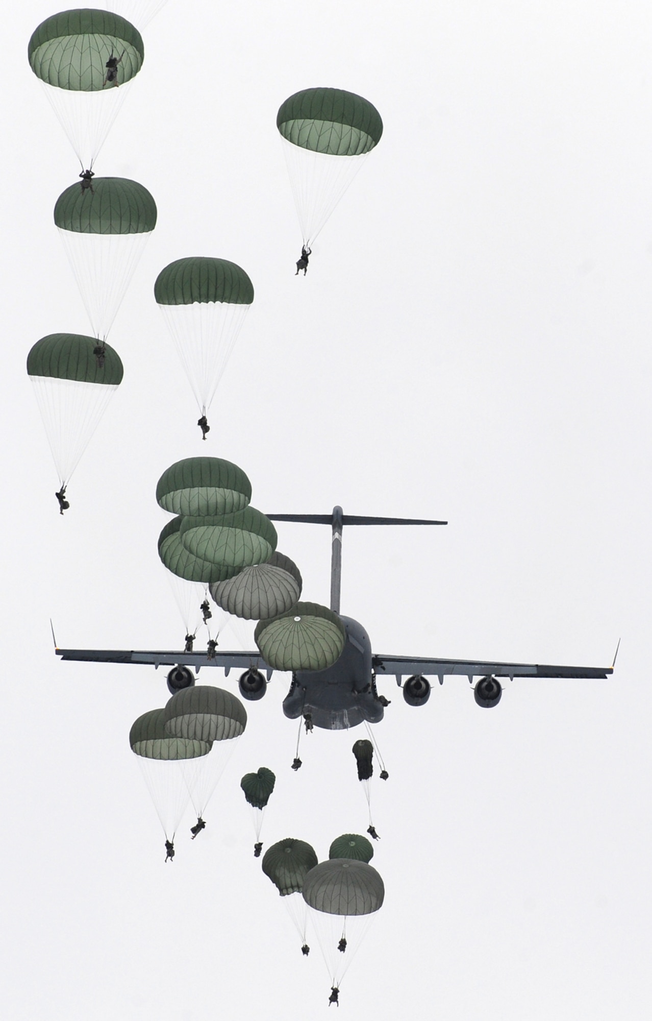 JOINT BASE ELMENDORF-RICHARDSON, Alaska -- Paratroopers of U.S. Army Alaska's 4th Brigade Combat Team (Airborne), 25th Infantry Division conduct a training parachute assault on Malamute Drop Zone on Joint Base Elmendorf-Richardson, Tuesday, Nov. 13, 2012.  The brigade recently returned from a ten-month tour in Afghanistan, and approximately 200 of the unit's Soldiers made the jump into their sub-arctic home installation. (U.S. Air Force photo by Justin Connaher)
