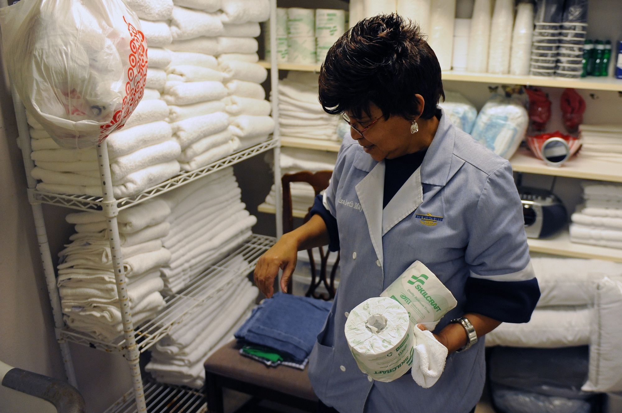 Elizabeth Mays, 2nd Force Support Squadron housekeeping, gathers items from a supply closet on Barksdale Air Force Base, La., Nov. 8. The Barksdale Inn has 263 rooms available in eight different buildings for occupants to enjoy. The inn also accommodates travelers with pets. (U.S. Air Force photo/Senior Airman Micaiah Anthony)(RELEASED)