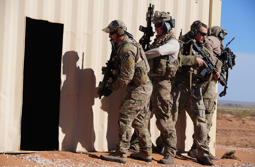 Special forces unit members prepare to clear a building during an exercise at Melrose Air Force Range, N.M., Nov. 13, 2012. The range is one of Air Force Special Operations Command’s premiere training facilities and is utilized by multiple agencies and branches of the armed forces. (U.S.  Air Force photo/Airman 1st Class Ericka Engblom)