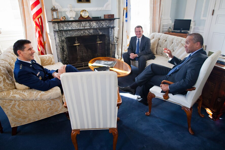 BOSTON – Massachusetts Gov. Deval Patrick and Lt. Gov. Timothy Murray meet with Lt. Gen. C.D. Moore, Air Force Life Cycle Management Center commander, in the governor's office Nov. 14. Moore visited with leaders from state government, industry and academia to hear about the work they’ve been doing to support Hanscom and to discuss potential collaborative efforts aimed at helping the Air Force meet critical national security objectives. (Courtesy photo by Eric Haynes / Governor's Office)