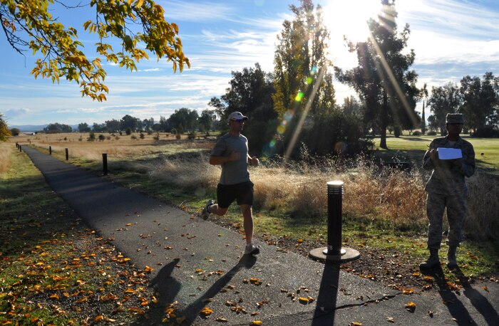 A member Team Beale races to the finish line during the Turkey Trot 5K at Beale Air Force Base, Calif., Nov. 14, 2012. The top two male and female runners won a turkey. (U.S. Air Force photo by Staff Sgt. Robert M. Trujillo/Released)