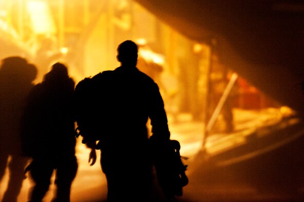 Members of a special forces unit walk off an MC-130J Commando II during an exercise at Melrose Air Force Range, N.M., Nov. 5, 2012. The range is one of the Air Force’s premiere training facilities and is utilized by multiple agencies and branches of the armed forces. (U.S. Air Force photo/Airman 1st Class Xavier Lockley)