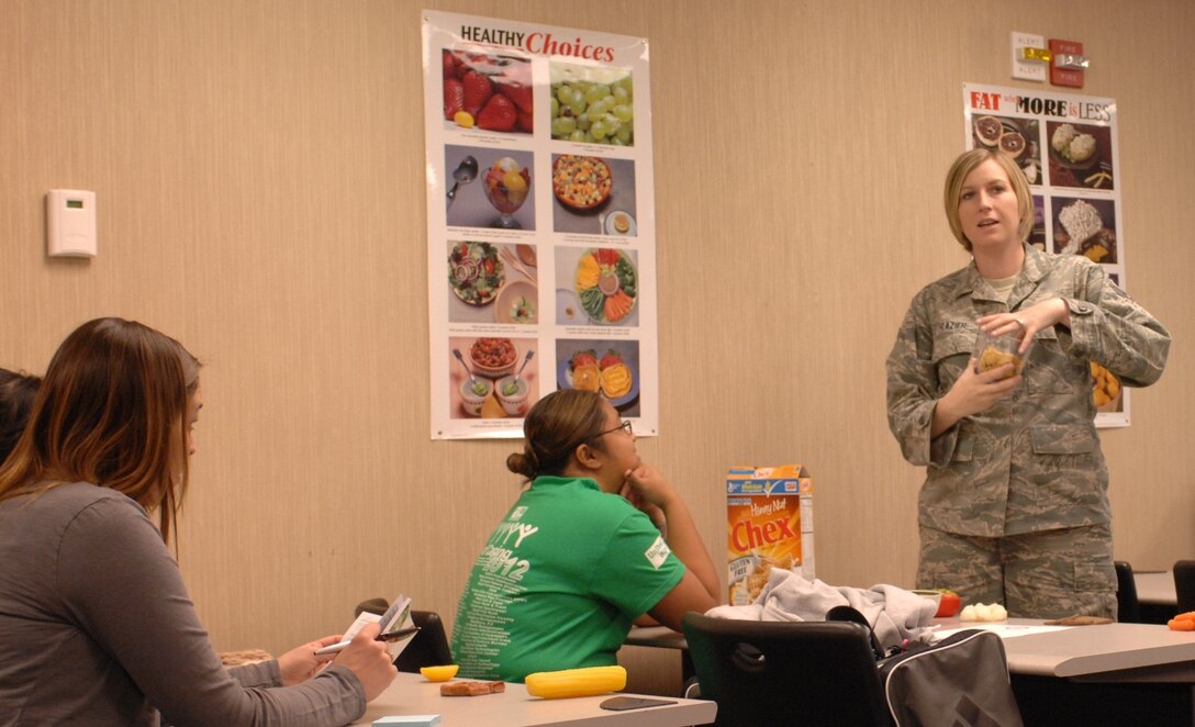 Staff Sgt. Crystal Frazier, 28th Medical Operations Squadron diet therapist, instructs a class on choosing foods based off of nutrition labels during the “Better Body, Better Life” course at the Health and Wellness Center on Ellsworth Air Force Base, S.D., Nov. 8, 2012. Airmen and their families may have a better idea about the food they consume by reading the nutrition content versus the common misconception of believing one product is healthier than the other. (U.S. Air Force Photo by Airman 1st Class Audra M. Hornbacher/Released)