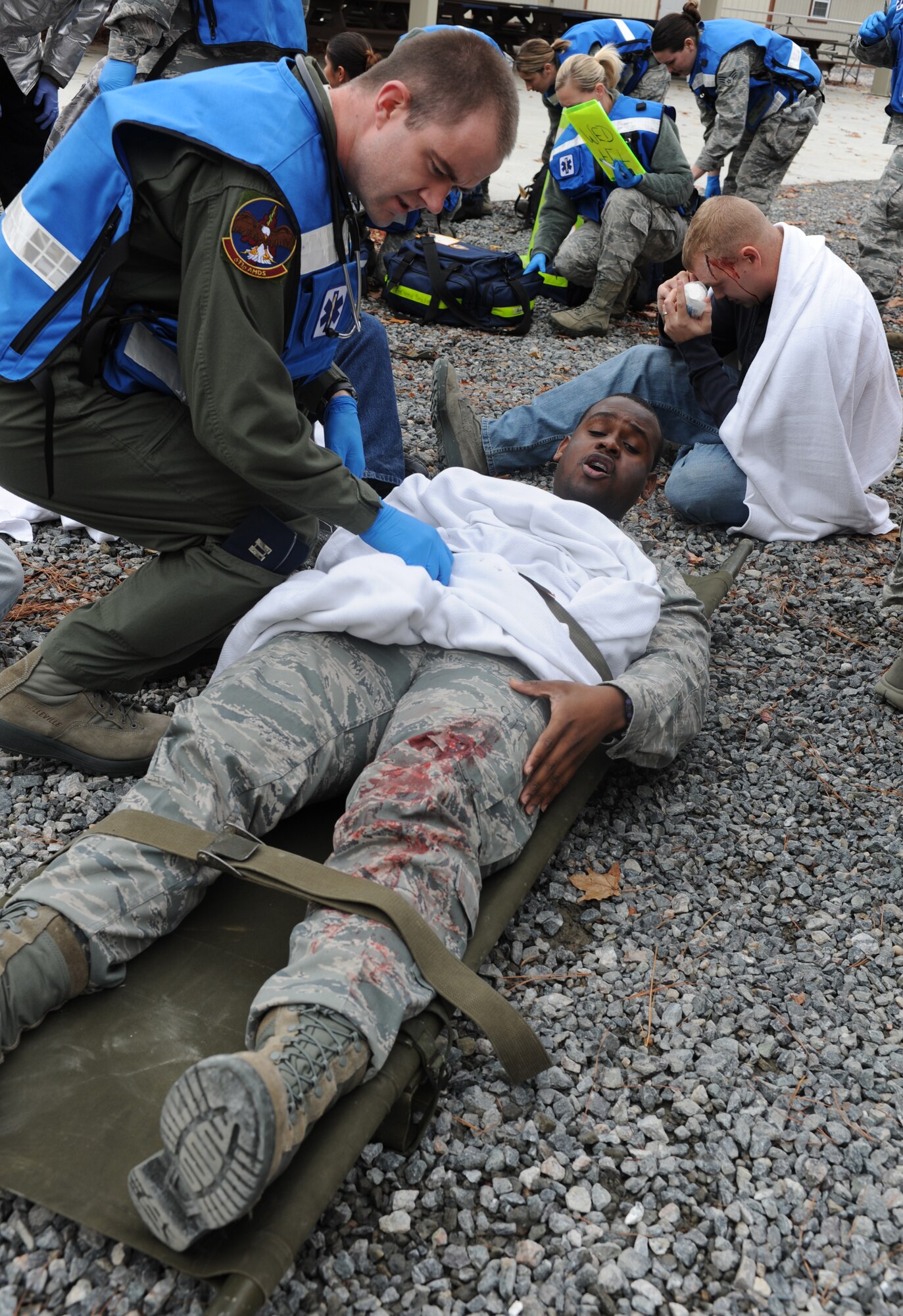 Members of the 633rd Aerospace Medicine Squadron provide medical care to simulated victims during an active shooter exercise at Langley Air Force Base, Va., Nov. 15, 2012. The exercise was held to access first responders’ capabilities in mitigating emergencies and contingencies affecting Langley. (U.S. Air Force photo by Airman 1st Class Teresa Aber/Released)