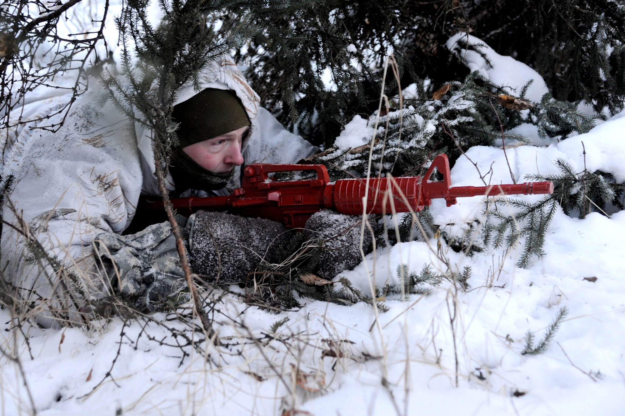 U.S Air Force Staff Sgt. Matthew Carr, 354th Security Forces Squadron electronic security systems NCO in charge, poses as an active shooting during an operational readiness exercise Nov. 7, 2012, Eielson Air Force Base, Alaska. The week-long exercise is designed to give Icemen the opportunity to test their ability to go through the deployment process and respond to various scenarios. (U.S. Air Force photo/Staff Sgt. Jim Araos)