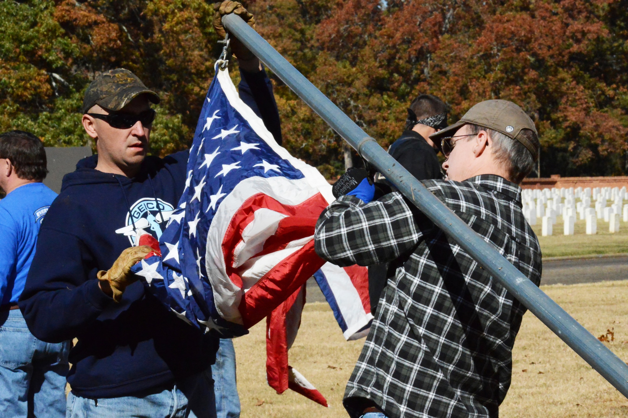 In observance of this year’s Veterans Day, several members of the Robins Riders Motorcycle Group, from on and off base, traveled to Andersonville National Cemetery where they set up 100 flags. (U. S. Air Force photo/Ed Aspera)