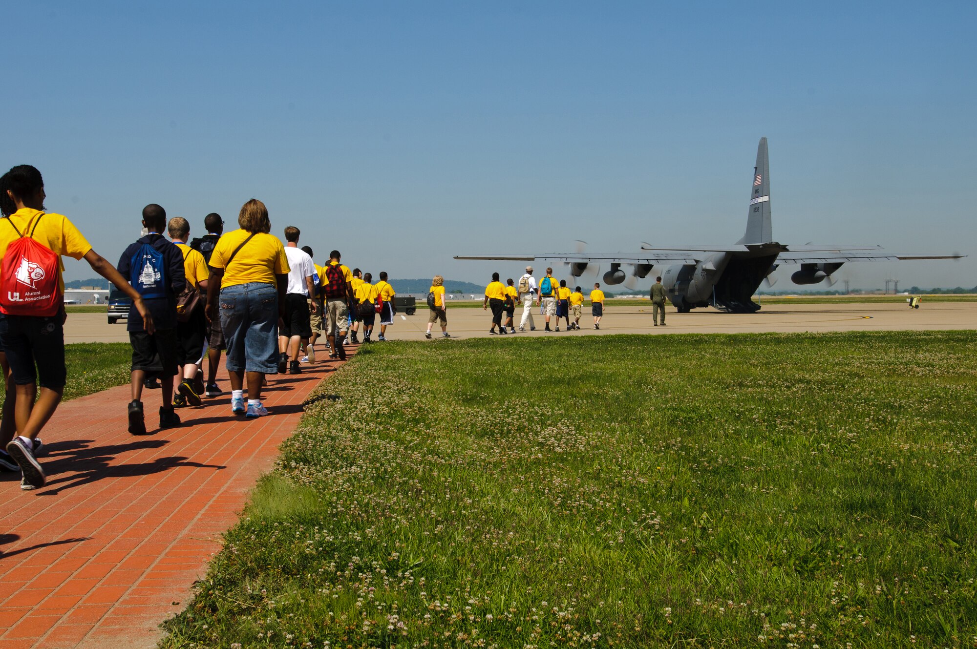 Local middle and high school students board a 123rd Airlift Wing C-130 prior to an orientation flight from the Kentucky Air National Guard Base in Louisville, Ky., on June 15.  The students were participating in an Organization of Black Aerospace Professionals aviation camp designed to educate young minds about the world of aviation. (U.S. Air Force photo by Master Sgt. Phil Speck)