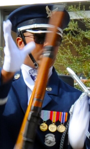 A Drill Team Member spins his M-1 rifle during a drill performance at Mount Dora High School in Mount Dora, Fla., Nov 12, 2012.  The Drill Team was invited to the school my the Mount Dora High School Junior Reserve Officer Training Corps.  (U.S. Air Force photo/Staff Sgt. Torey Griffith)