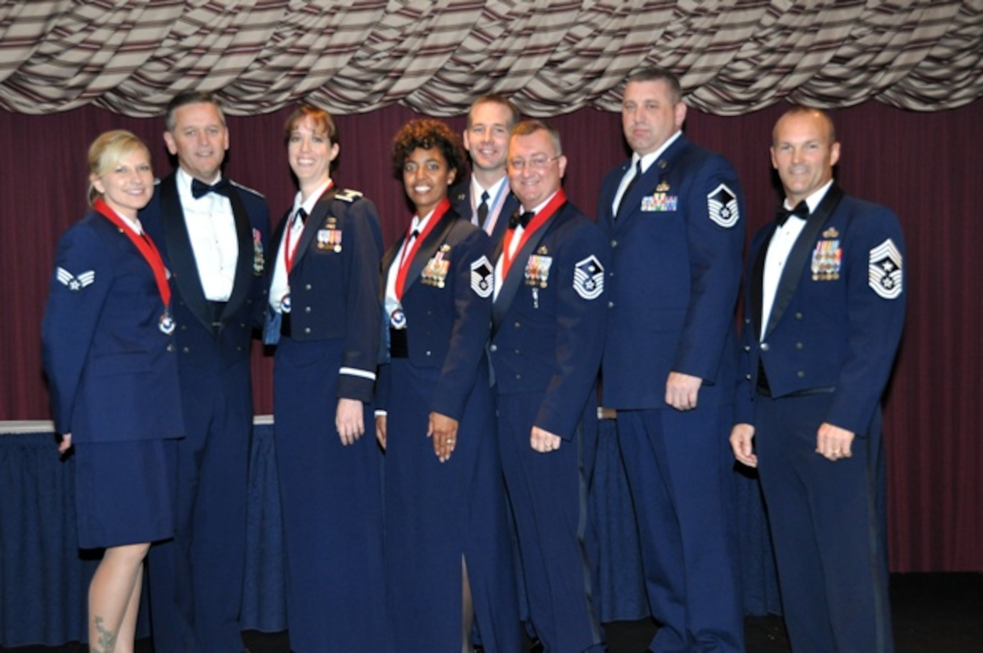 507th Air Refueling Wing 
11/16/2012 TINKER AIR FORCE BASE Okla. - The 507th 2012 award winners come together for a night of celebration.  From Left to Right:  Senior Airman Fallon Carte, Colonel Russell Muncy, Captain Jacquelyn Stauffer,  Senior Master Sergeant Taunya Avery, Master Sergeant Shaun Loeffler, Master Sergeant Joseph Lepine, Master Sergeant Travis Fowler (filling in for a deployed Staff Sergeant Robert Mills), and Chief Master Sergeant Stephen Brown.  (U.S. Air Force photo by Senior Airman Mark Hybers)