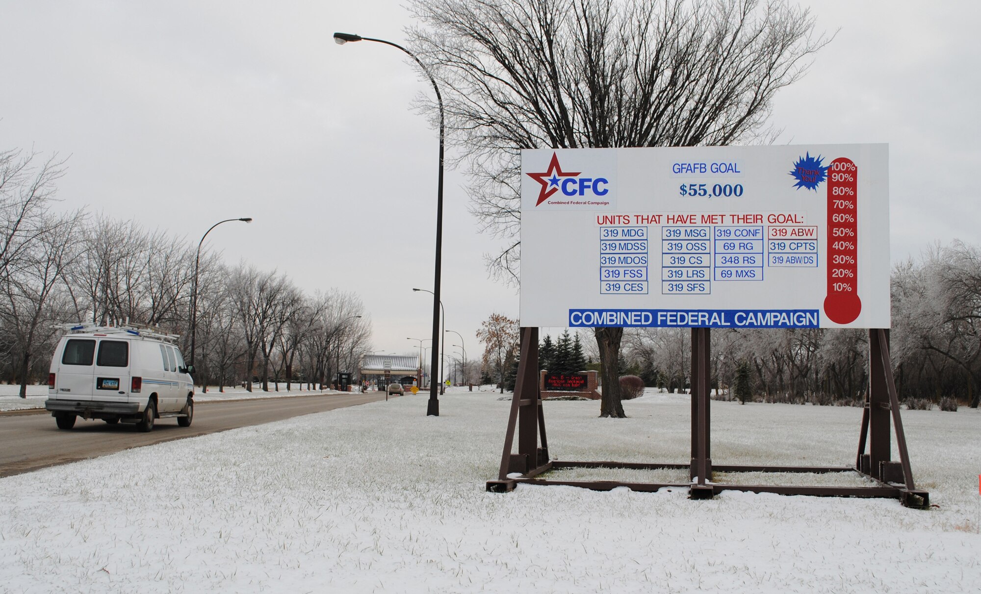 A billboard with a red-filled thermometer displays the 100 percent completion of the $55,000 goal for the 2012 Combined Federal Campaign, Nov. 13, 2012, on Grand Forks Air Force Base, N.D. The billboard was placed near the east main entrance of the base, and was used to publicly track the installation’s progress during the six-week long fundraising event. The base raised a grand total of $70, 347 -- surpassing its original goal by 27.9 percent. (U.S. Air Force graphic/Senior Airman Luis Loza Gutierrez)