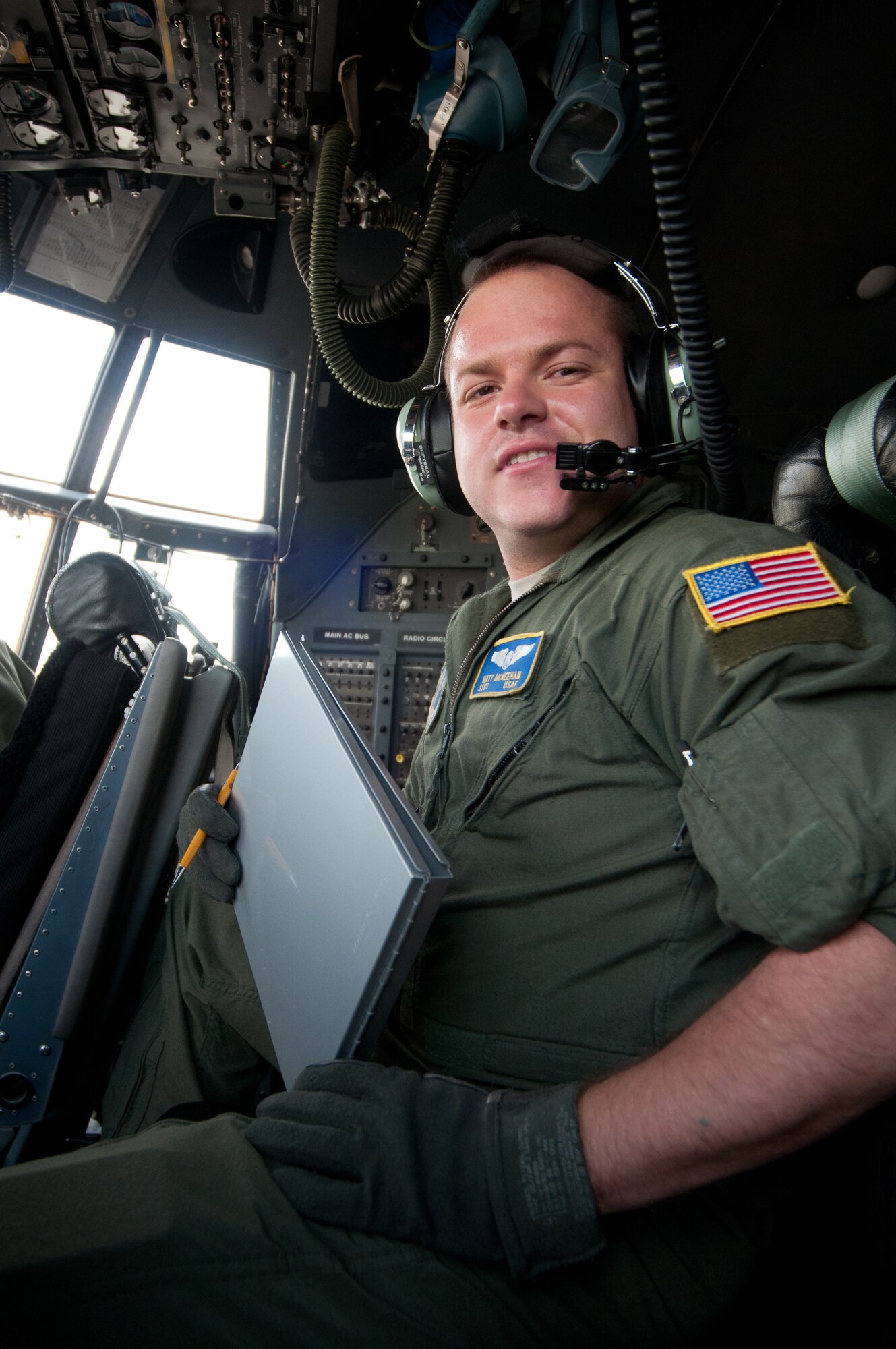 Tech. Sgt. Matthew McKeehan is a flight engineer for the Kentucky Air National Guard's 165th Airlift Squadron. Flight engineers are responsible for monitoring fuel systems, electrical systems, hydraulics and pneumatics. Sitting between three officers on the flight deck, they also compute take-off and landing data. (U.S. Air Force photo by Master Sgt. Phil Speck)
