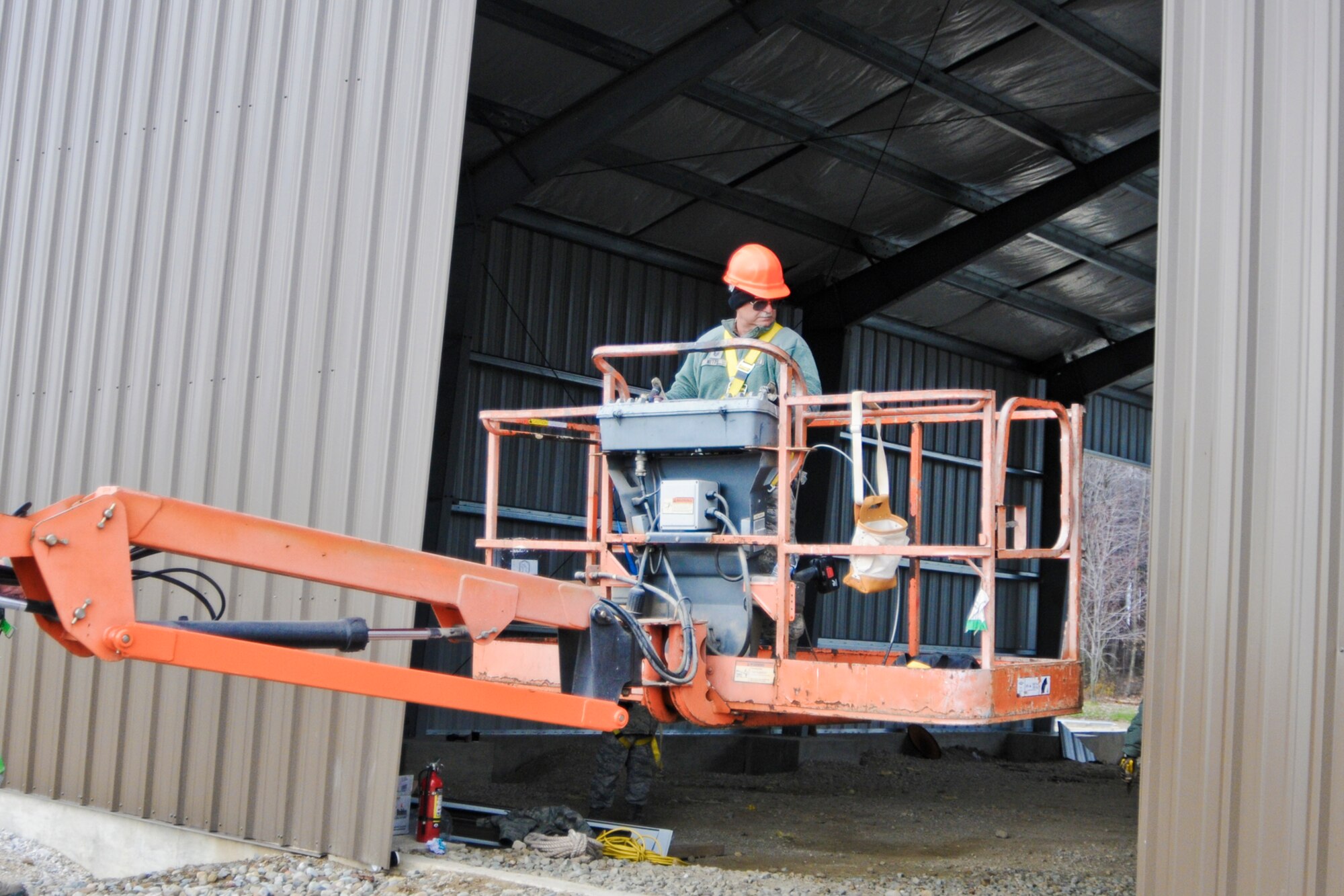 YOUNGSTOWN AIR RESERVE STATION, Ohio — U.S. Air Force Reserve Master Sgt. Robert D. Metts, skilled tradesman with 910th Civil Engineers here, positions an elevated work platform Nov. 14, 2012 before he begins work at the civil engineer training site here. The new training site will offer valuable training to civil engineer squadrons from several units, while adding usable training and exercise structures to YARS. Released/U.S. Air Force photo by Tech. Sgt. Brenda Cosola
