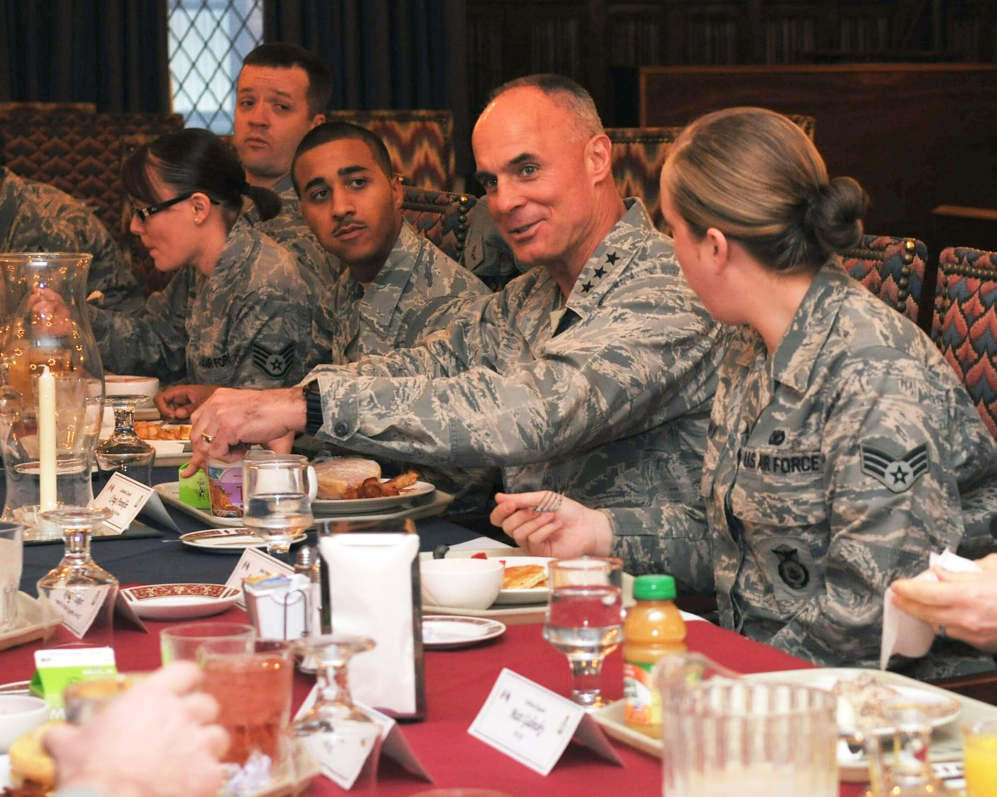 Lt. Gen. Craig Franklin, 3rd Air Force commander, Ramstein Air Base, Germany, speaks to 100th Mission Support Group Airmen Nov. 15, 2012, at the Gateway Dining Facility at RAF Mildenhall, England. During his visit, the general toured the 100th Civil Engineer Squadron Fire Department, 100th Logistics Readiness Squadron Fuels Processing, 100th Maintenance Group Sheet Metal, 100th Operations Group and a static display of a KC-135 Stratotanker. While in England, the general also visited RAF Fairford, RAF Croughton, RAF Welford, RAF Lakenheath, and the Cambridge American Cemetery at Madingley. (U.S. Air Force photo by Senior Airman Jerilyn Quintanilla/Released)