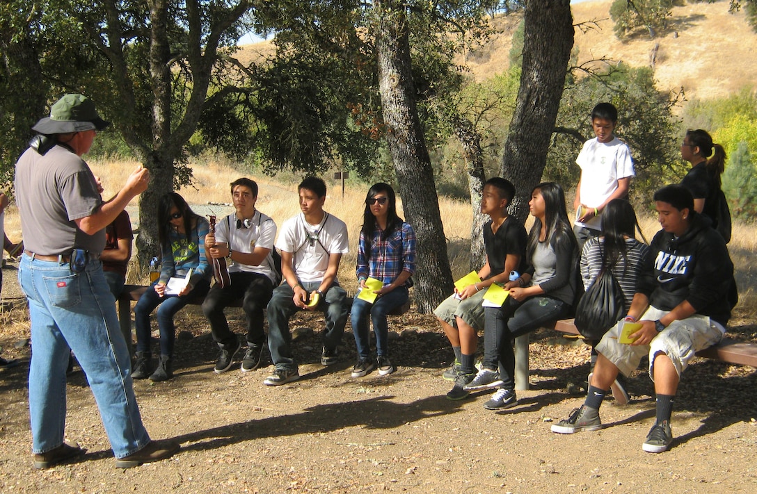 James Marsh, left, retired teacher and Friends of the Lower Calaveras River member, summarizes after conducting a nature journaling activity during Calaveras River Appreciation and Education Day, Oct. 27, 2012, at New Hogan Lake. Students learned how to create a journal entry and sought out natural treasures in the area during this activity.