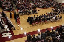 Burnsville, Minn., recruiter Sgt. Richard Dibiaso, 32, from Aurora, Ill., addresses the New Prague High School student body during their Veterans Day ceremony on Nov. 12.   