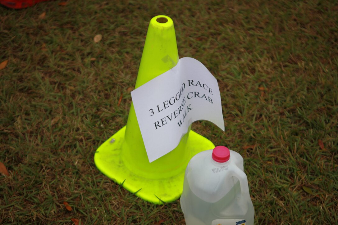 A piece of paper taped to a cone serves as a guide for servicemembers with Headquarters Company, Combat Logistics Regiment 27, 2nd Marine Logistics Group participating in team-based activities during fall training aboard Camp Lejeune, N.C., Nov. 6, 2012. Competitive events helped build camaraderie while participants learned about issues such as tobacco use and injury prevention. 