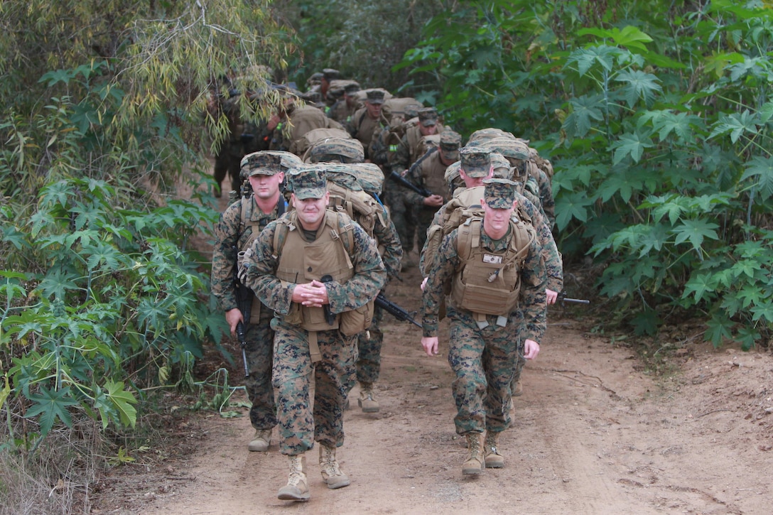 Marines with Charlie Company, 7th Engineer Support Battalion, 1st Marine Logistics Group, hike at Camp Pendleton, Calif., Nov 15. The Marines hiked six miles with their combat gear in an effort to keep themselves prepared for any future combat operations.