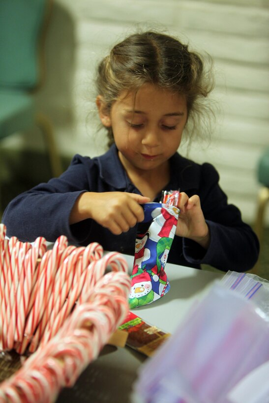 Combat Logistics Regiment 17, 1st Marine Logistics Group organized a holiday stocking stuffer party for friends, families and volunteers at Camp Pendleton, Calif., Nov. 14. Participants filled stockings with chocolate, candy canes and snacks to send to Marines and sailors deployed to Afghanistan.