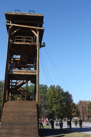 A Marine assigned to the Chemical Biological Incident Response Force descends the rappel tower at the Downey Responder Training Facility aboard Naval Annex Stump Neck during the second phase of the Commander’s Challenge on Nov. 6.