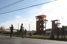 Almost done: Marines with the Chemical Biological Incident Response Force finish the last of three three-mile runs before the have to move on to the knowledge, physical and knot tasks to complete the CBIRF Commander’s Challenge on Nov. 6.