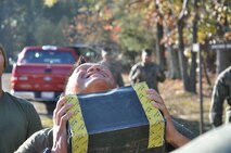 Captain Andrew Liu contributes his part to the 600 ammo can lift during the first phase of the Chemical Biological Incident Response Force Commander’s Challenge on Nov. 6. 