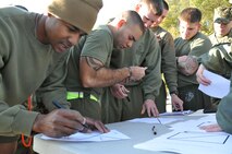 Knowing is half the battle: Marines assigned to the Chemical Biological Incident Response Force are quizzed about FEMA signs at the Commander’s Challenge on Nov. 6. 
