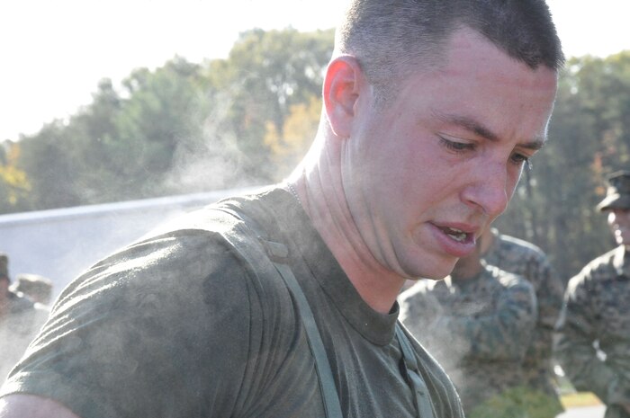 Steam rolls off Sgt. Michael Gannon, an Extract Marine assigned to React Company with the Chemical Biological Incident Response Force, after he completed a three-mile run in protective MOPP gear and a gas mask during the second phase of the CBIRF Commander’s Challenge on Nov. 6. 