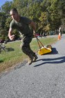 Cpl. Donte Dukes, an Extract Marine with the Chemical Biological Incident Response Force, pulls a casualty sled during the third and final phase of the Commander’s Challenge on Nov. 6.