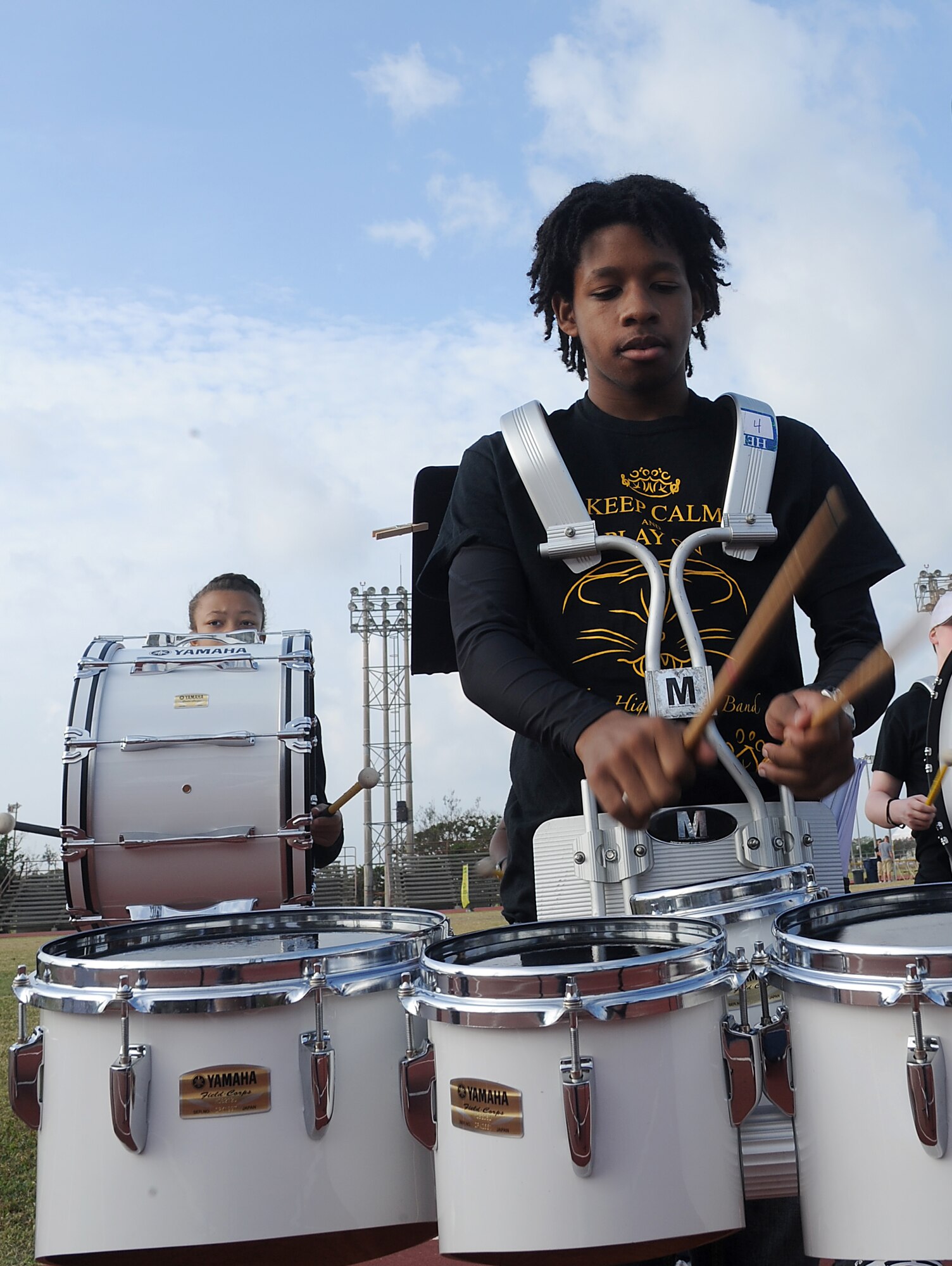Daniell Tucker, a drummer with Kadena High School Band, plays during the opening ceremonies of the 13th annual Kadena Special Olympics on Kadena Air Base, Japan, Nov. 17, 2012. Kadena Special Olympics began in 2000 with approximately 400 athletes and 600 volunteers as an 18th Wing community goodwill initiative to strengthen U.S. - Okinawa relationships. After 13 years, the event has tripled in size and participation. (U.S. Air Force photo/Staff Sgt. Laszlo Babocsi)