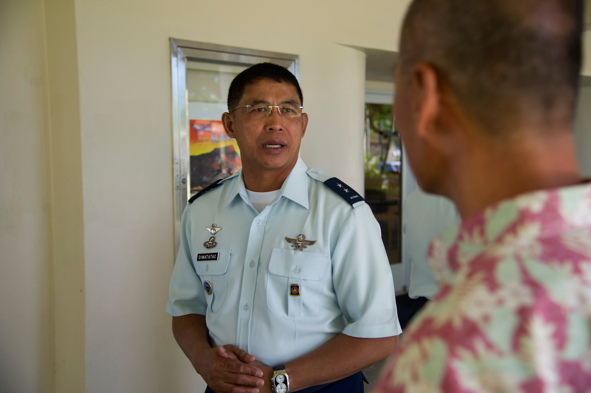Maj. Gen. Raul Dimatatac, vice commander, Philippine Air Force, discusses joint training efforts with members of the United States Pacific Air Forces staff at the first United States and Philippine Airman-to-Airman Talks here at Joint Base Pearl Harbor-Hickam.  Since taking office in 2010, Philippine President Benigno Aquino III has reached out to the United States in an effort to bolster mutual training opportunities in order to better his nation’s forces for territorial defense and maritime security through events like the Airman-to-Airman Talks.  (U.S. Air Force photo/Staff Sgt. Matthew S. Bright)