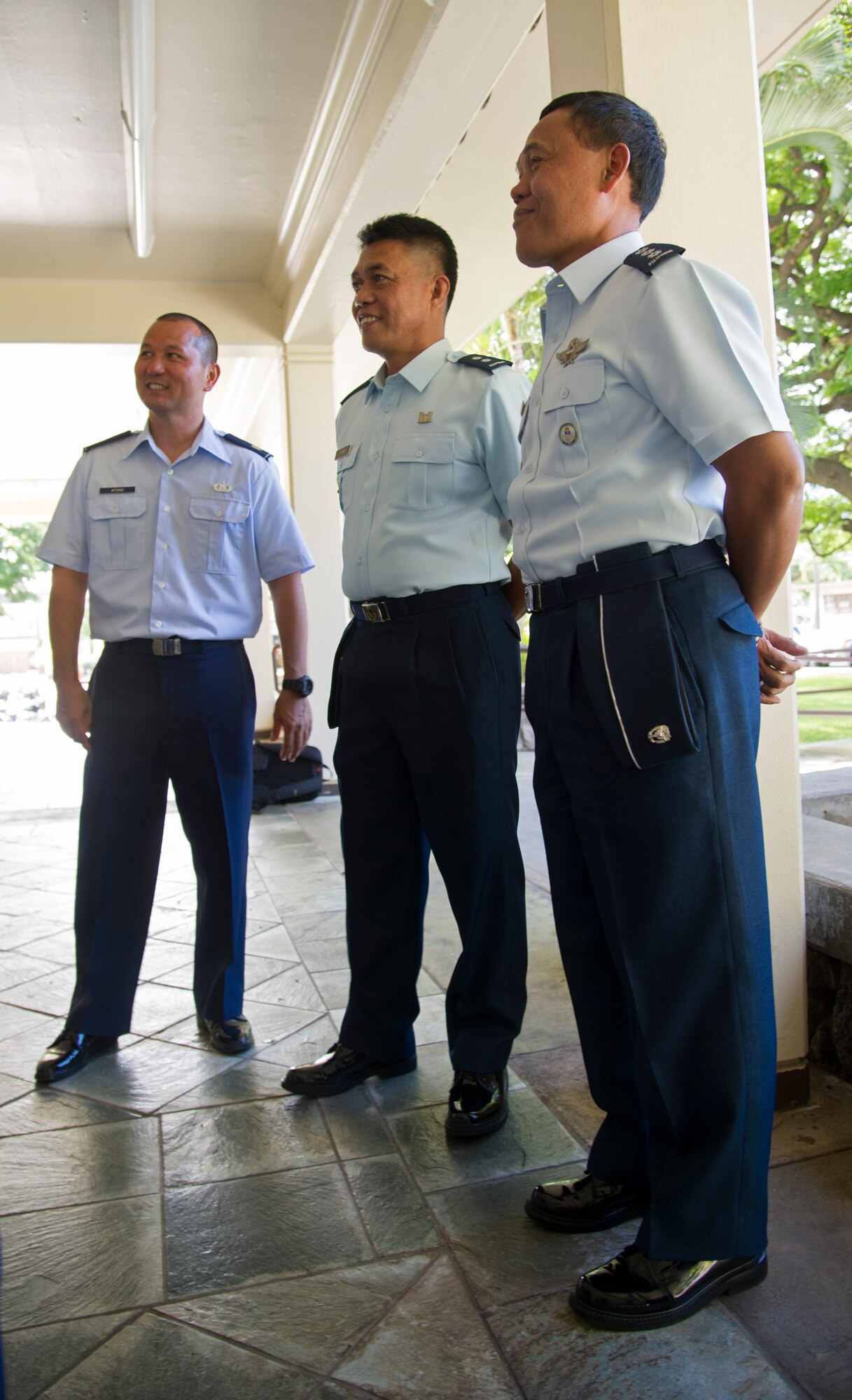 Maj. Clifford Afong, Hawaiian Air National Guard, enjoys a short break from briefings with two Philippine Air Force airmen at the first United States and Philippine Airman-to-Airman Talks here at Joint Base Pearl Harbor-Hickam.  Over the past decade, the U.S. has sought to reinvigorate ties with the Philippines, primarily through the Defense Reform effort, helping enact President Obama’s strategic rebalance of U.S. military interest toward the Pacific. (U.S. Air Force photo/Staff Sgt. Matthew S. Bright)