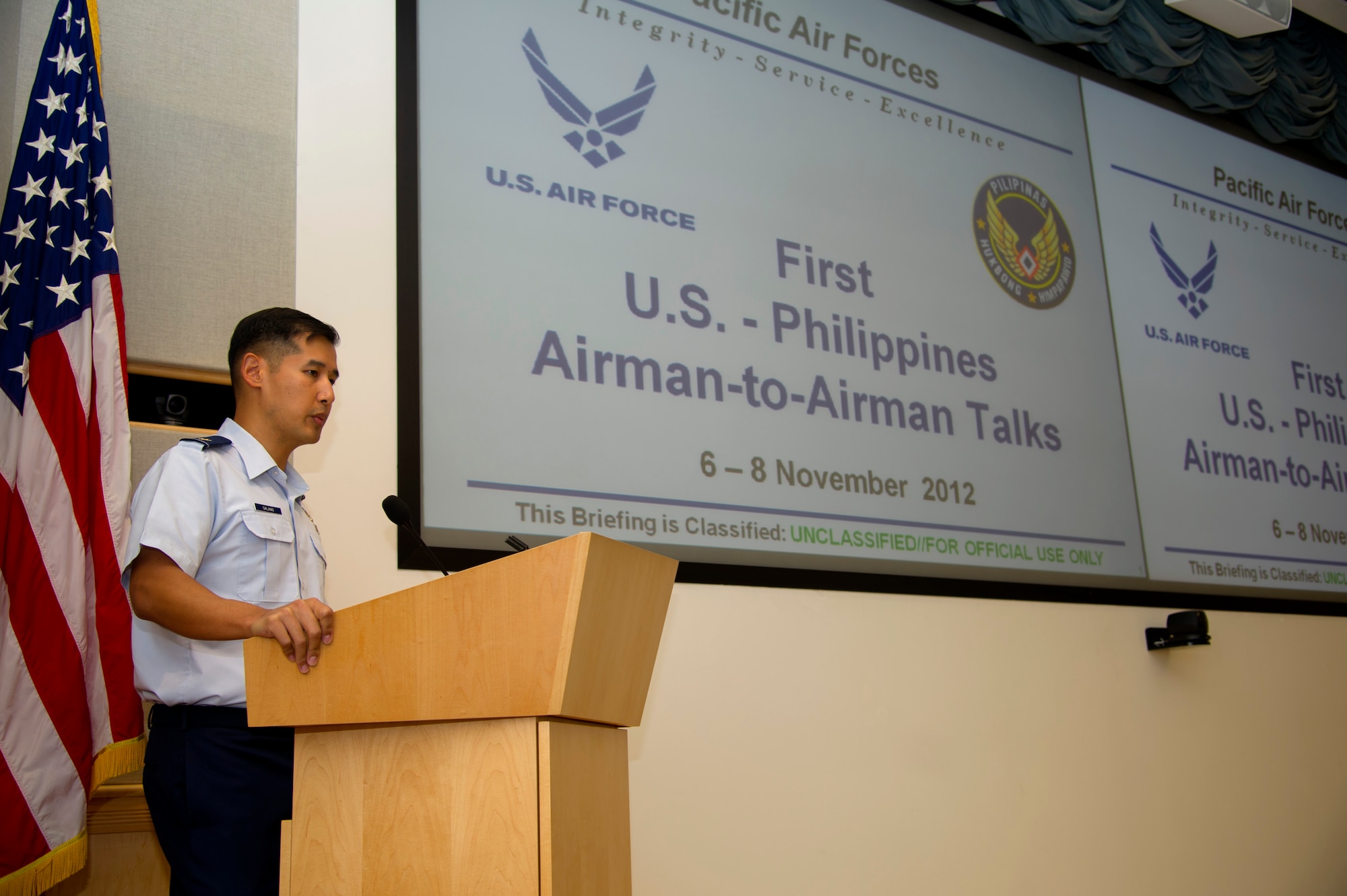 Maj. Adrian Galang, Pacific Air Forces International Affairs desk officer for Burma, Cambodia, Laos, the Philippines and Thailand, welcomes members of the Philippine Air Force to the first United States and Philippine Airman-to-Airman Talks here at Joint Base Pearl Harbor-Hickam.  The Airman-to-Airman Talks are intended to strengthen bilateral relationships between the two air forces, establish an annual forum to discuss airpower topics and to determine joint activities for next calendar year. (U.S. Air Force photo/Staff Sgt. Matthew S. Bright)  