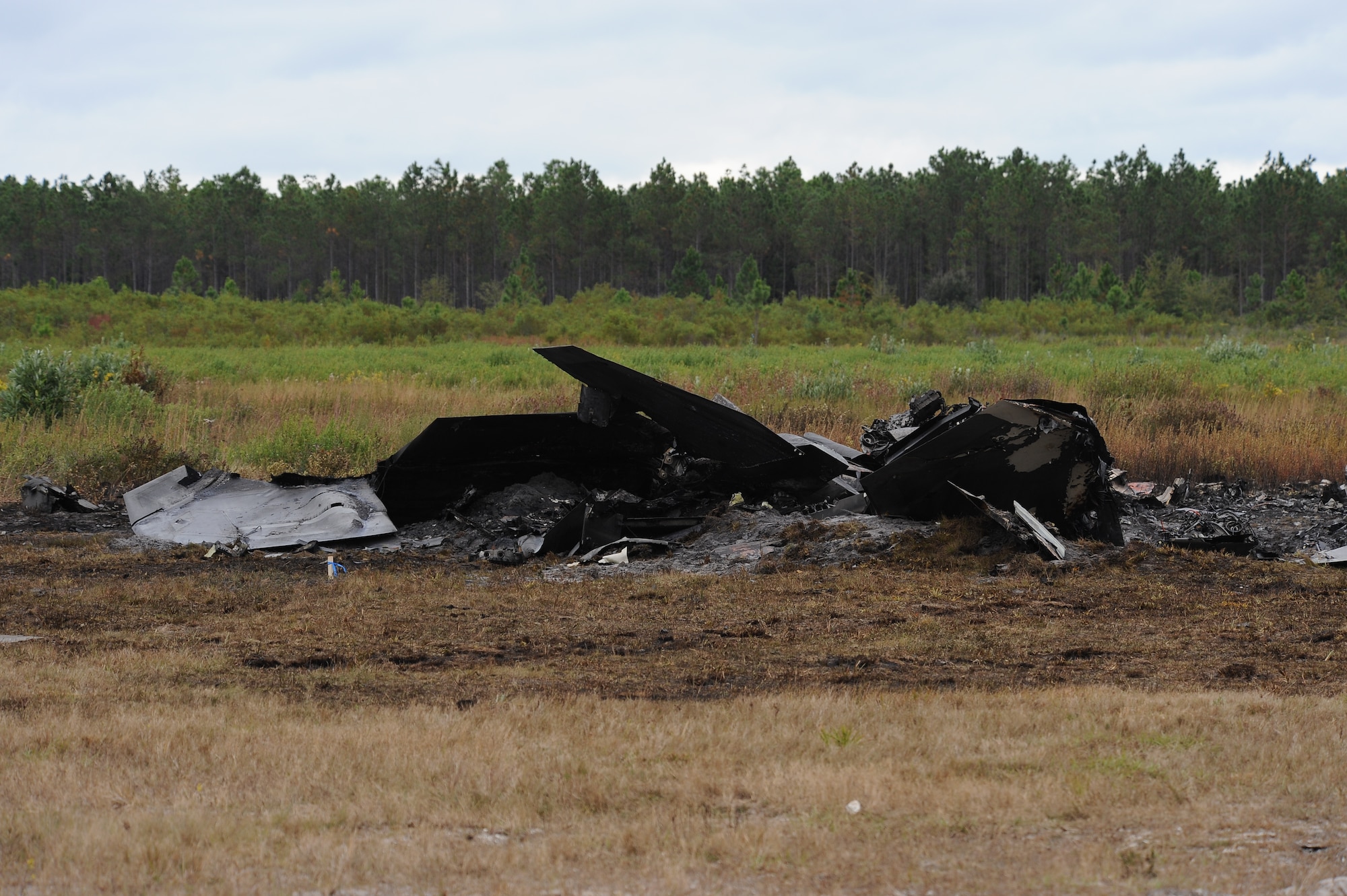 Shown is a photograph of the F-22 Raptor crash site from the incident Nov. 15 on Tyndall. 325th Fighter Wing officials are continuing to investigate and secure the scene. The pilot safely ejected from the aircraft and first responders were on the scene in less than two minutes. (U.S. Air Force photo by Lisa Norman)