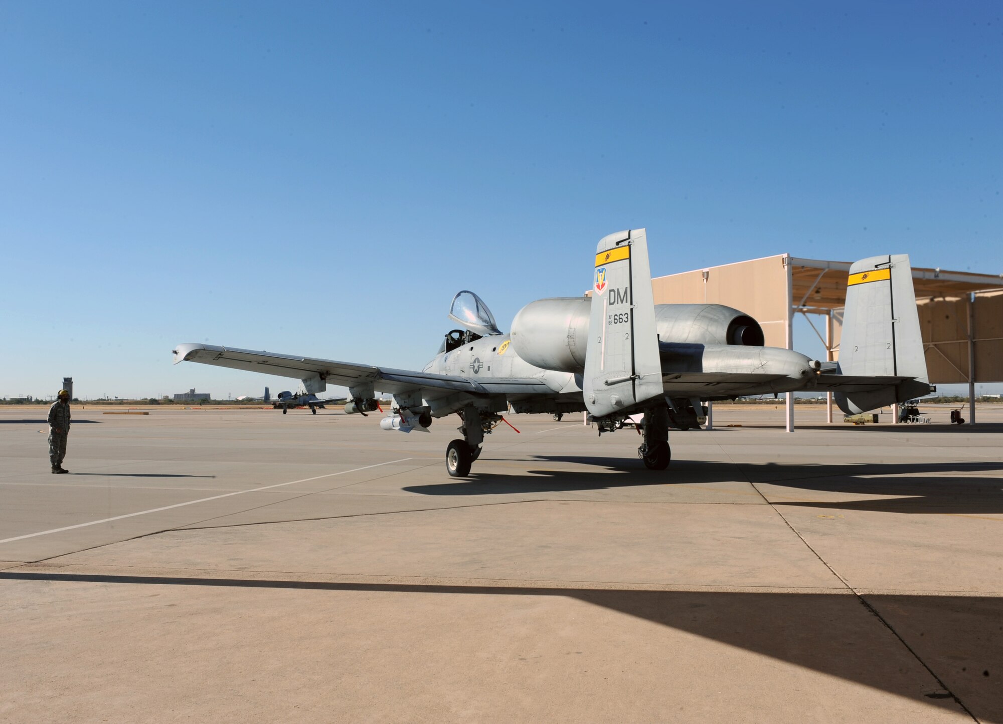 U.S. Air Force 1st Lt. Eric Calvey, 357th Fighter Squadron, taxis of the flightline on Davis-Monthan Air Force Base, Ariz., Nov 7, 2012. The 357th FS mission is to train pilots to plan, coordinate, execute, and control day and night close air support, battlefield surveillance and reconnaissance in support of friendly ground forces. (U.S. Air Force photo by Airman 1st Class Christine Griffiths/Released)