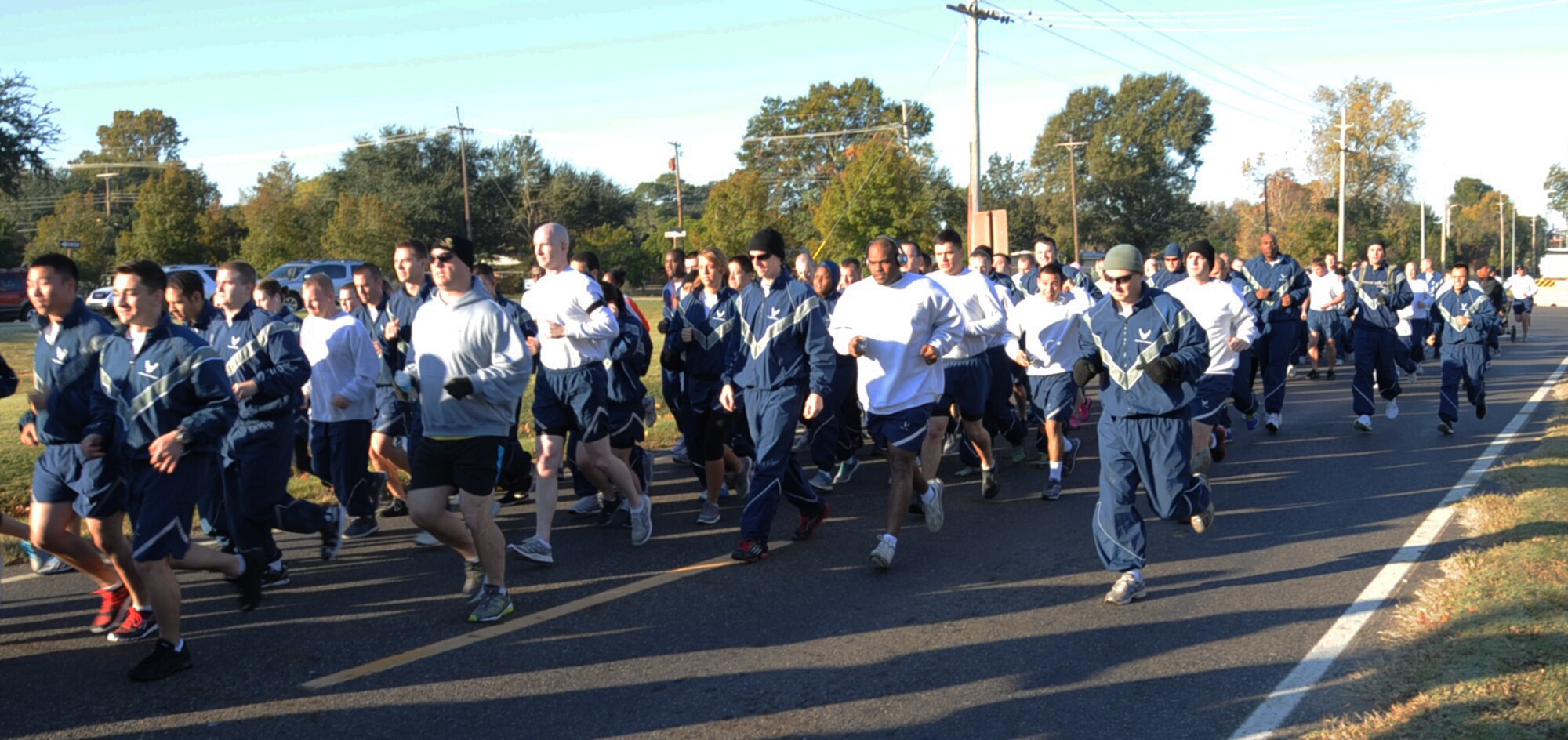 Team Barksdale participates in a 5K Fun Run as part of Sports Day 2012 on Barksdale Air Force Base, La., Nov. 16. Sports Day consists of various team events including dodgeball, basketball, soccer, tug-of-war, volleyball, a homerun derby, flag football and racquetball. This day was designed to improve team work and help increase the awareness of fitness, sports programs and boost morale. (U.S. Air Force photo/Senior Airman Sean Martin)(RELEASED) 