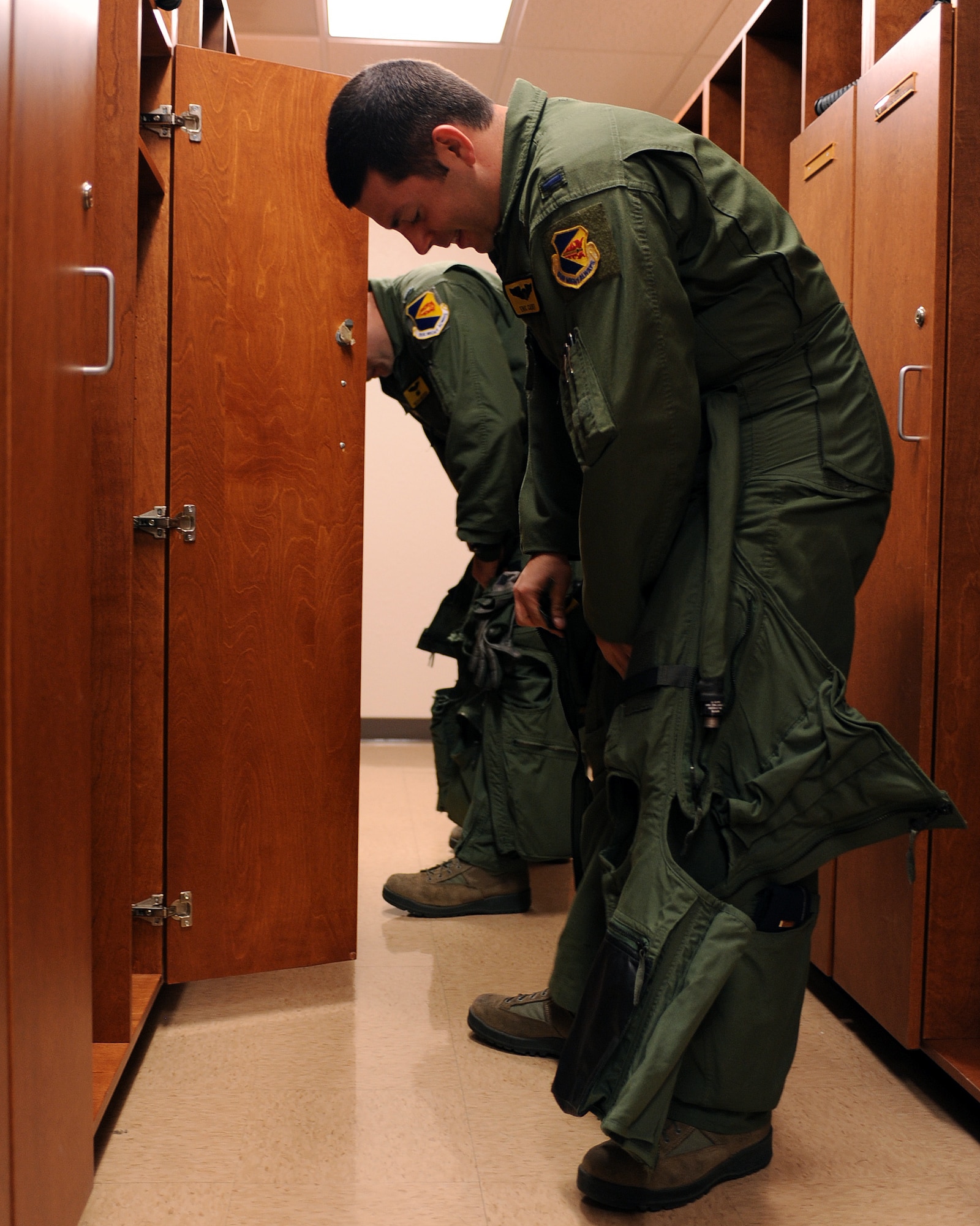 U.S. Air Force 1st Lt. Eric Calvey, 357th Fighter Squadron, suits up prior to leaving for the flightline on Davis-Monthan Air Force Base, Ariz., Nov. 7, 2012. The 357th FS student pilot training takes six months to complete.(U.S. Air Force photo by Airman 1st Class Christine Griffiths/Released) 