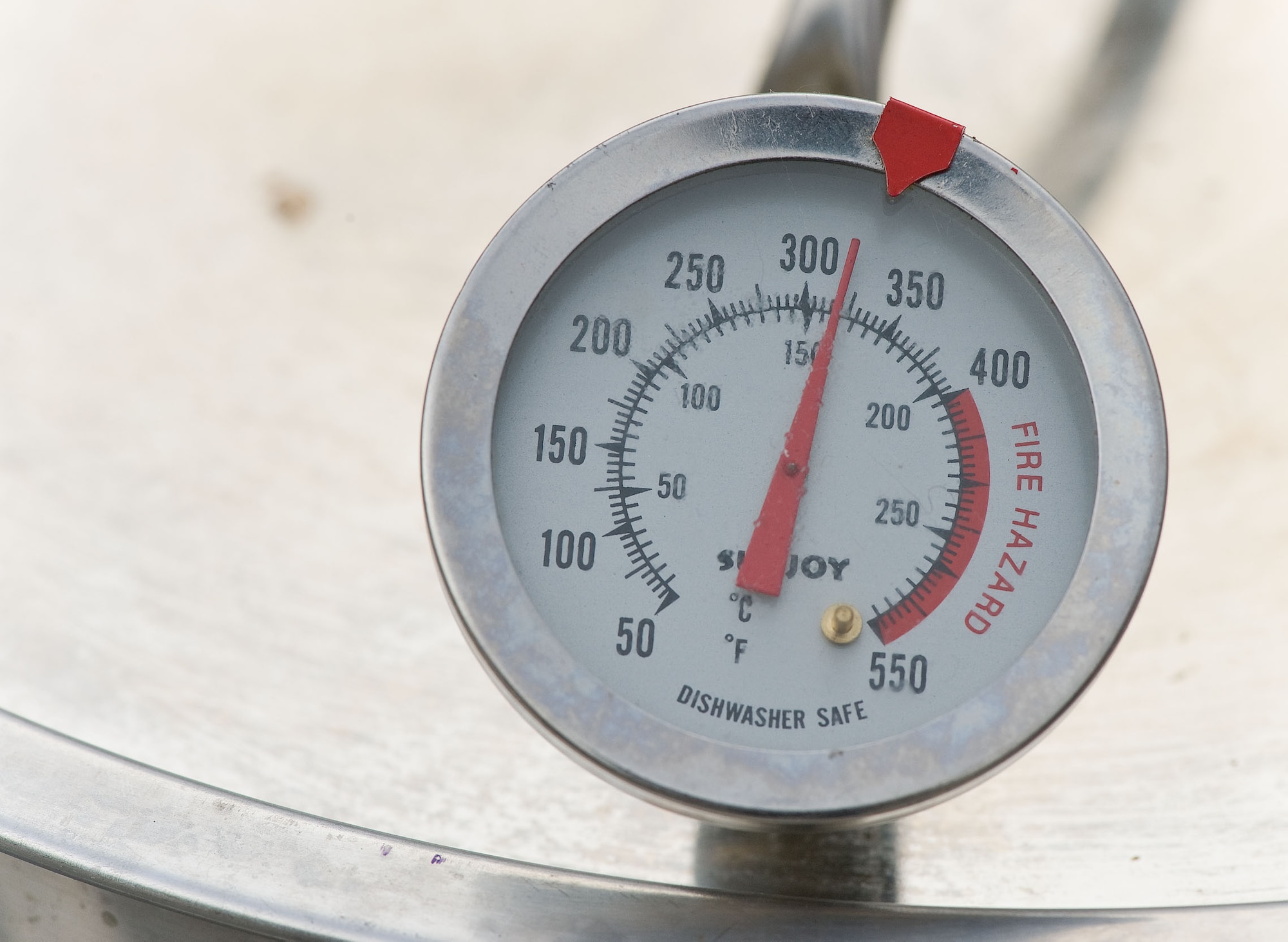 A thermometer lists the temperature of a turkey fryer Nov. 16, 2012, at Dover Air Force Base, Del. The oil temperature in the turkey fryer should be between 325 and 350 degrees while the internal meat of the bird should be between 175 and 180 degrees. (U.S. Air Force photo by Roland Balik)