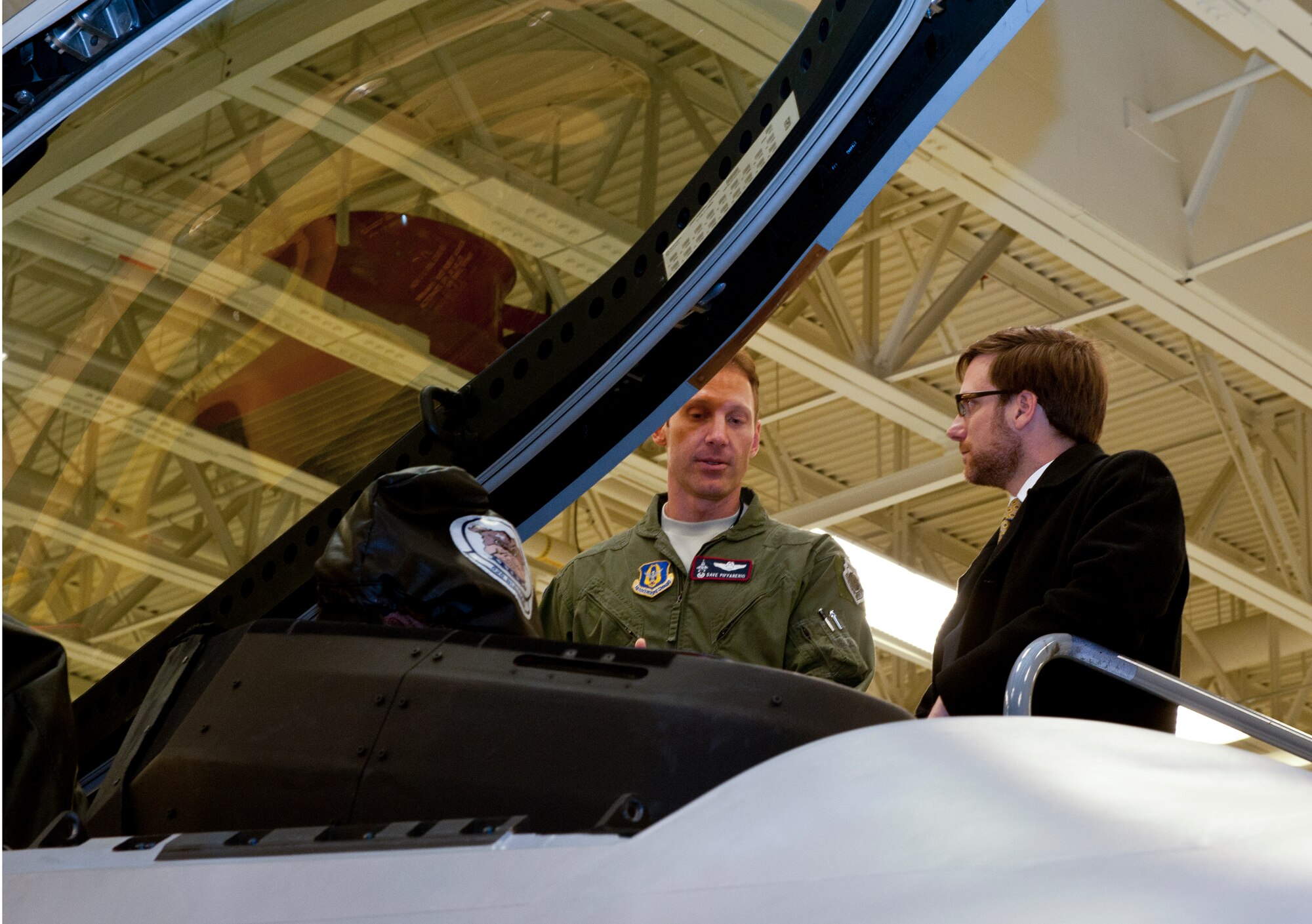 JOINT BASE ELMENDORF-RICHARDSON, Alaska – Lt. Col. David Piffarerio, 302nd Fighter Squadron commander,  shows Acting Under Secretary of the Air Force Dr. Jamie Morin the inside of an F-22 Raptor cockpit during a tour of the base Nov. 13, 2012. Morin visited the base to thank JBER Airmen for their service and address challenges ahead for the Air Force (U.S. Air Force Photo/Airman 1st Class Omari Bernard)

