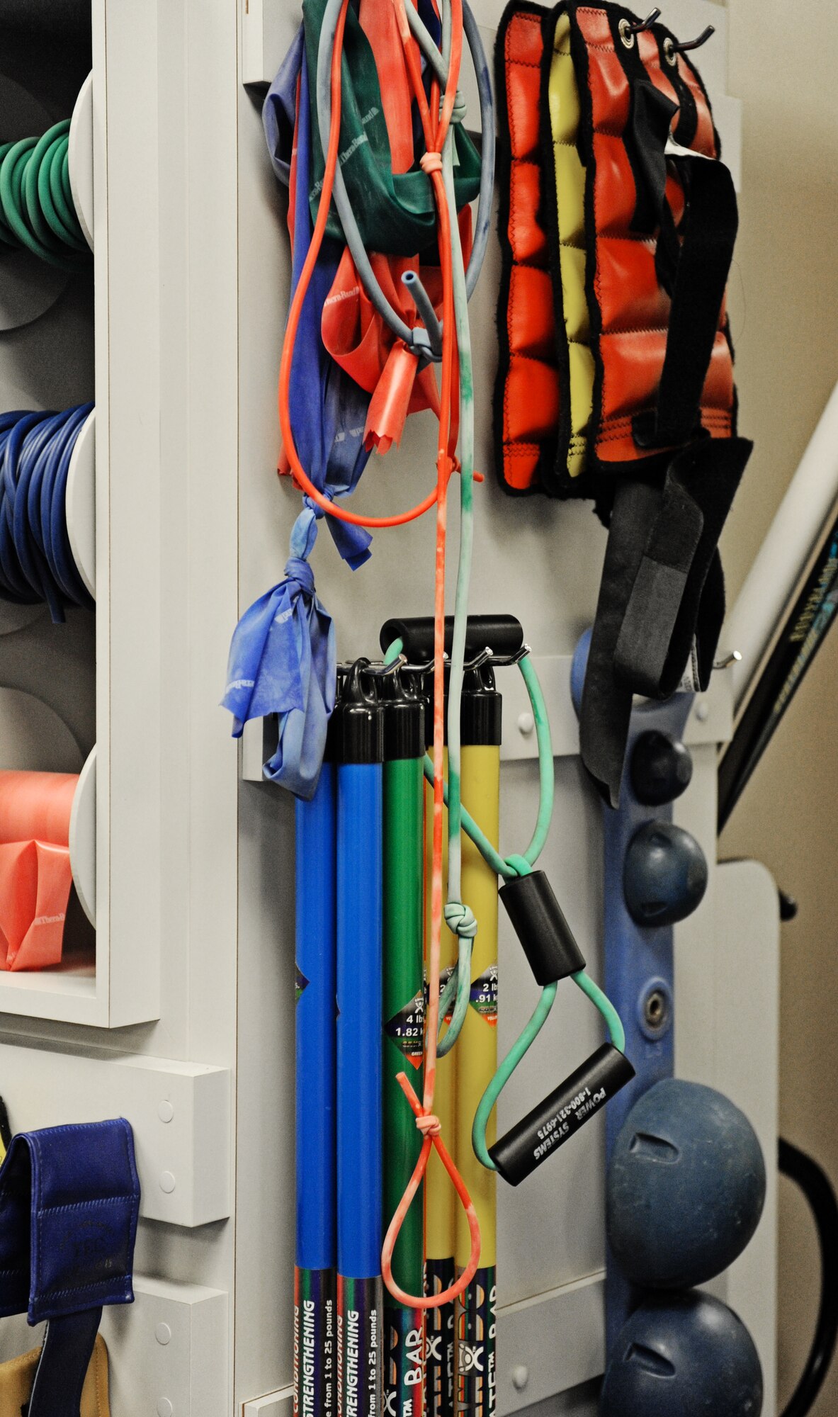 Equipment used in the physical therapy clinic hangs on racks Nov. 13 at Scott Air Force Base, Ill. The physical therapy clinic houses a wide variety of equipment for patients to use in order to rehabilitate their injuries. (U.S. Air Force photo/Airman Kris Lynch)