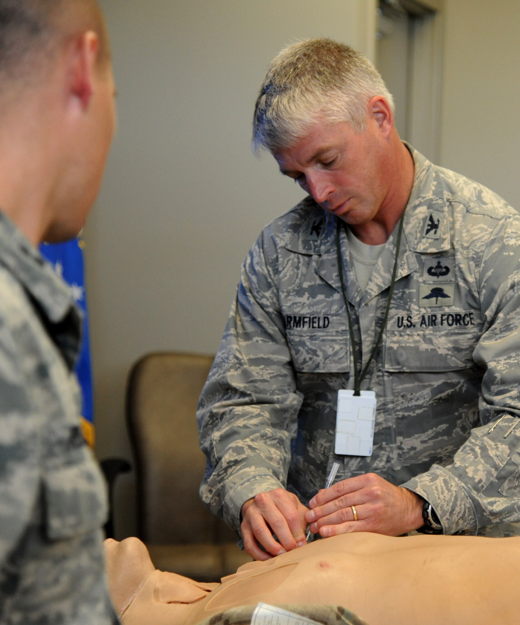 Col. Robert Armfield, 24th Special Operations Wing commander, practices needle decompression on a dummy during a Tactical Combat Casualty Care course Nov. 9, 2012 at Hurlburt Field, Fla. TCCC is taught to all special tactics personnel at least every two years and prior to deployments. (U.S. Air Force photo by Senior Airman Melanie Holochwost)  