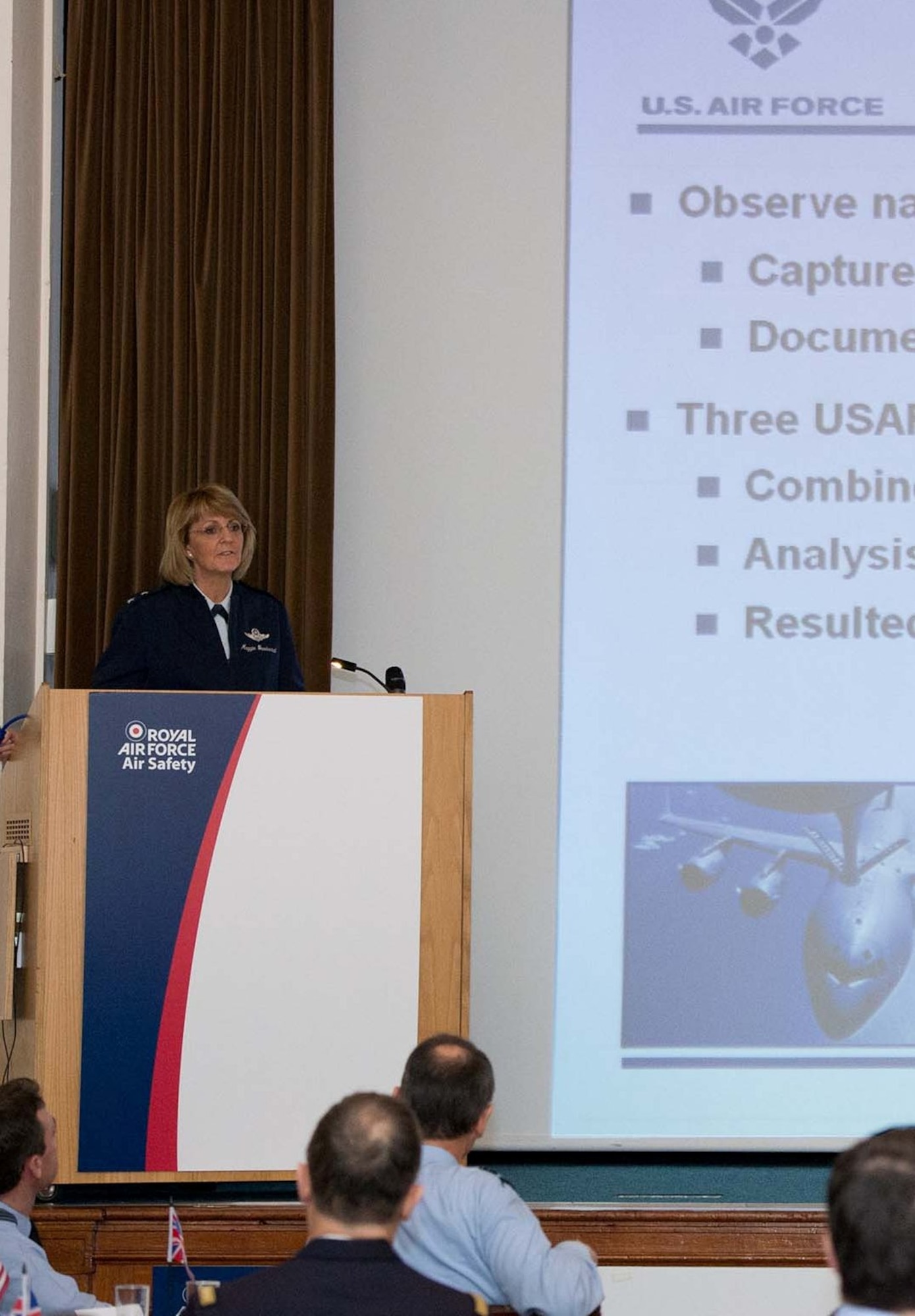 Maj. Gen. Margaret H. Woodward explains proactive aviation safety, identifying precursors to prevent the next mishap, at the International Air Safety Symposium held Nov. 7-8 at Royal Air Force Cranwell, U.K., attended by more than 100 military aviation safety specialists from around the globe. (Courtesy photo)  