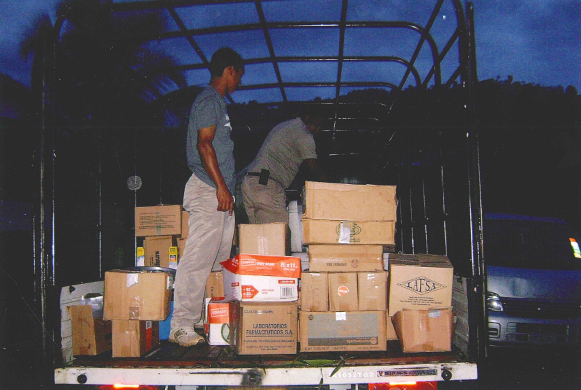 Panamanian volunteers load a truck with medical supplies for an overnight trip to the medical clinic at Valle del Risco. (Photo provided by Steve Macon)

