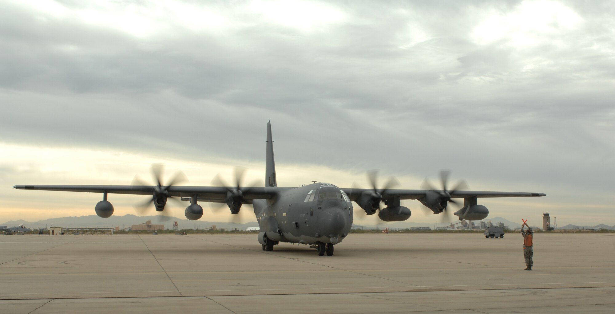 The new HC-130J gets marshaled in for its arrival ceremony at Davis-Monthan Air Force Base, Ariz., Nov. 15. The HC-130J is designed for Combat Search and Rescue missions. (U.S. Air Force photo by Senior Airman Michael Washburn/Released)
