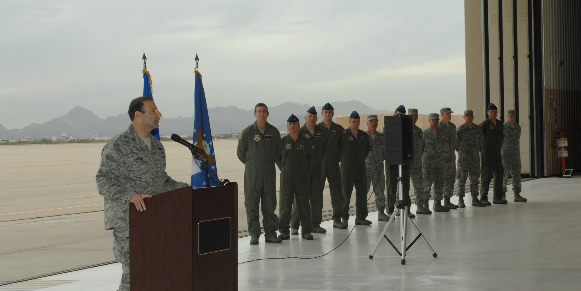 Col. Jason Hanover, 563rd Rescue Group commander addresses the crowd during the HC-130J Combat King II ceremony at Davis-Monthan Air Force Base, Ariz., Nov. 15. The J models has taken over for the P models which have been used since the 1960s. (U.S. Air Force photo by Senior Airman Michael Washburn/Released)