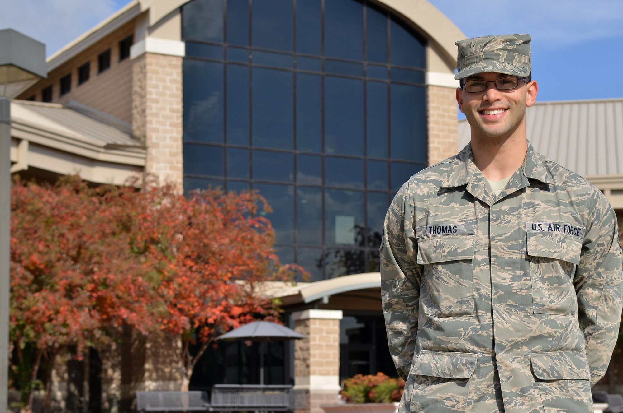 U.S. Air Force Senior Airman Dwight Thomas, 20th Fighter Wing Airfield Management shift lead, poses for a photo as this weeks Shaw Spotlight in front of the education center, Shaw Air Force Base, S.C., Nov. 16, 2012. Thomas is the Shaw Spotlight for Nov. 19 to Nov. 23. (U.S. Air Force photo by Airman 1st Class Ashley L. Gardner/ Released)	

