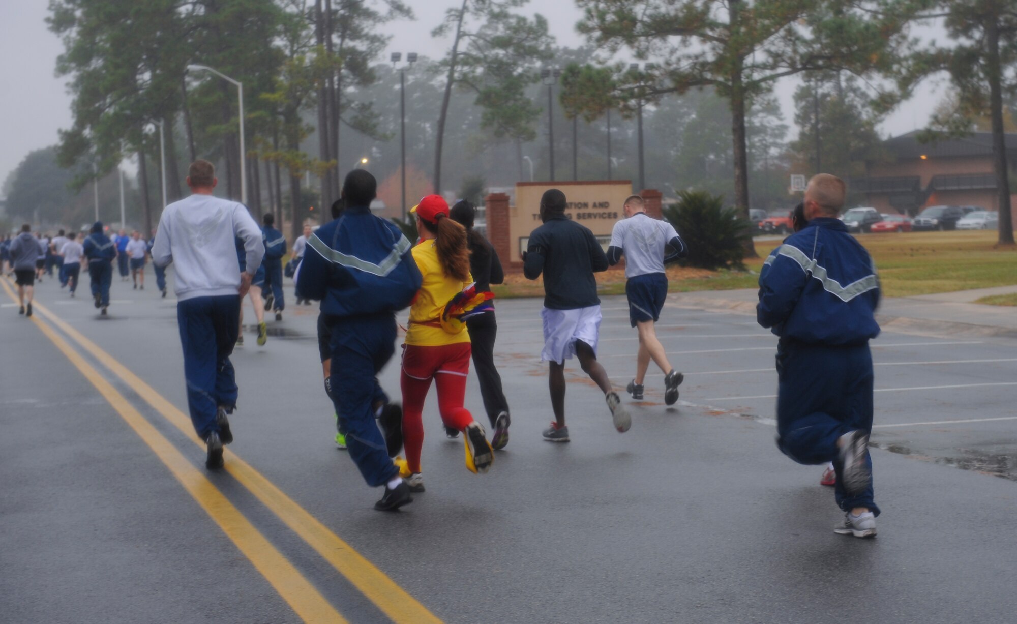 Members of Team Moody head toward the finish line during the first Turkey Chase 5K at Moody Air Force Base, Ga., Nov. 16, 2012. During the event, the Airmen Committed to Excellence committee collected donations for a local soup kitchen and handed out T-shirts to the winners of the 5K. (U.S. Air Force photo by Airman 1st Class Olivia Bumpers/Released)